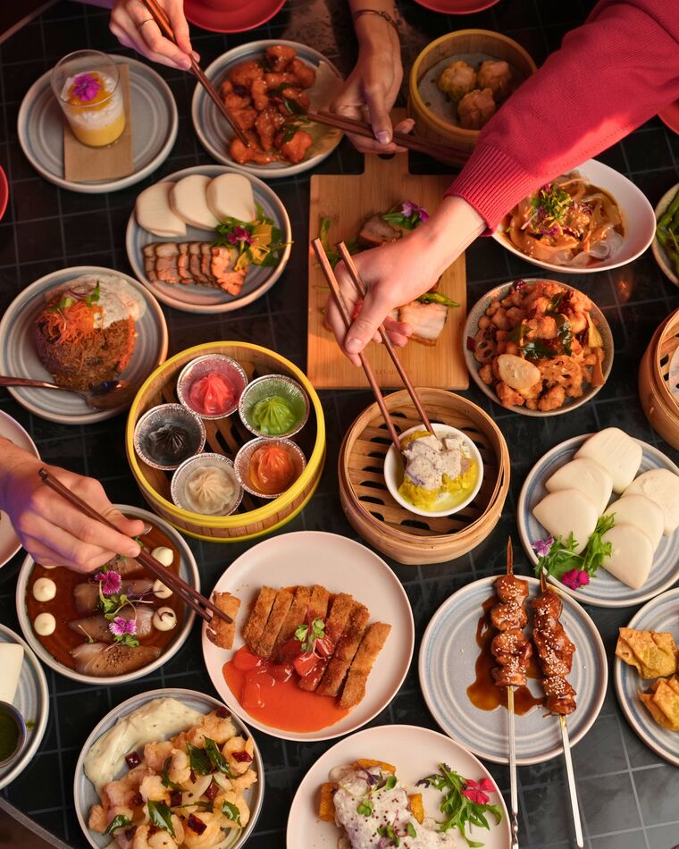 A full shared spread of yum cha at Lucky 8 Wellington