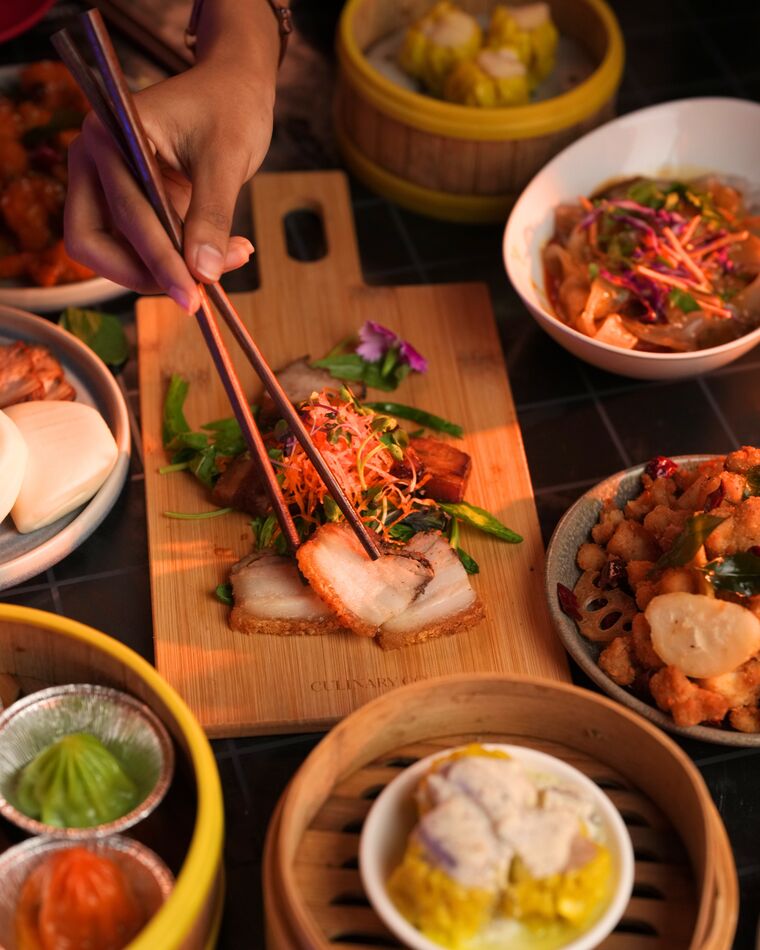 An overhead spread of yum cha dishes