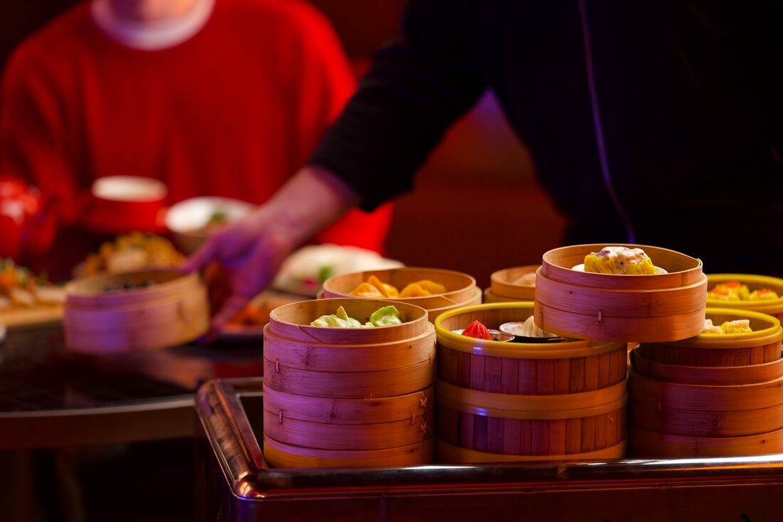 Bamboo steamer baskets on the roaming yum cha cart